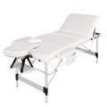 Klapppbare Massageliege aus Aluminium mit Zubehör, höhenverstellbar und tragbar, inkl. Kopfstütze, Armlehnen und Tragetasche - Weiß
